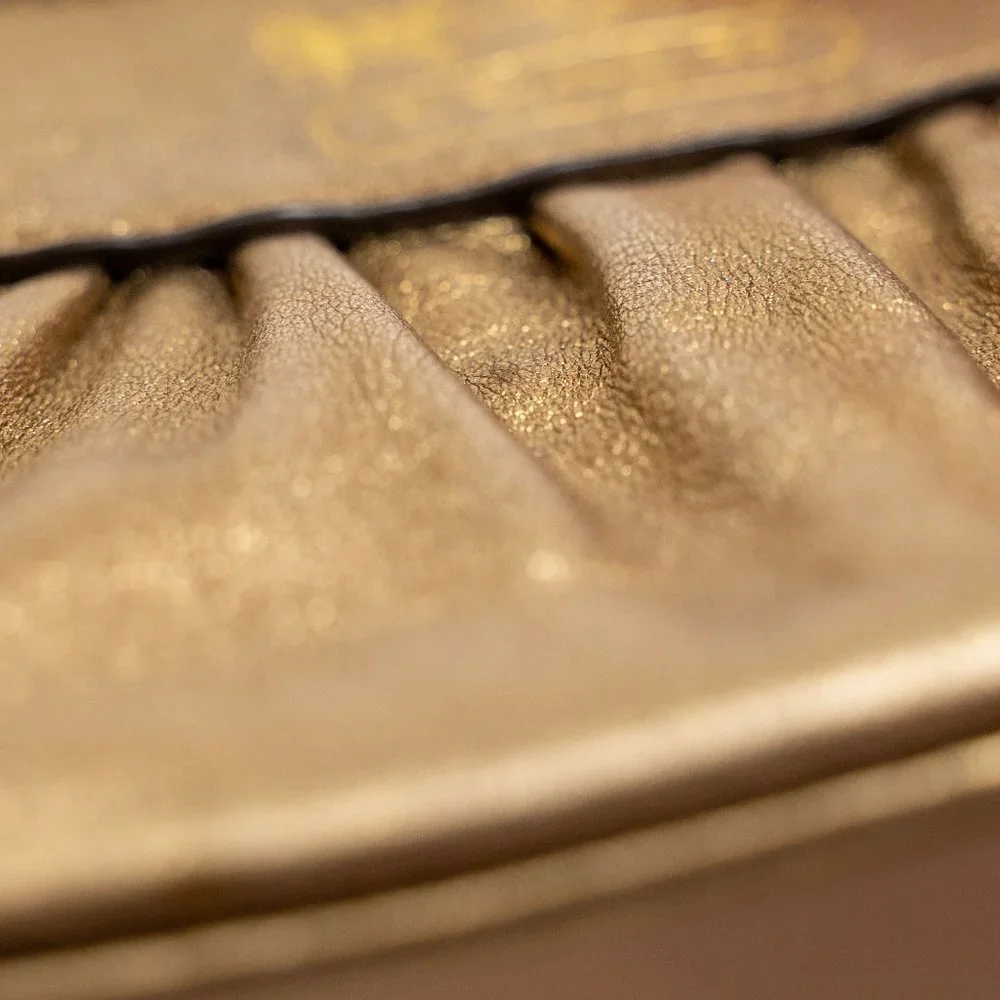 Coach Y2K Gold Leather Wristlet